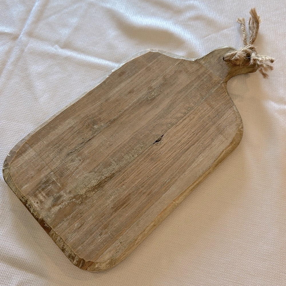 Small, rustic decorative or charcuterie board